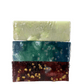 Stack of three handcrafted goat milk soap bars from the Melrose Soap Fall Collection — Haunted Sage, Enchanted Mist, and Moonlit Cherry.