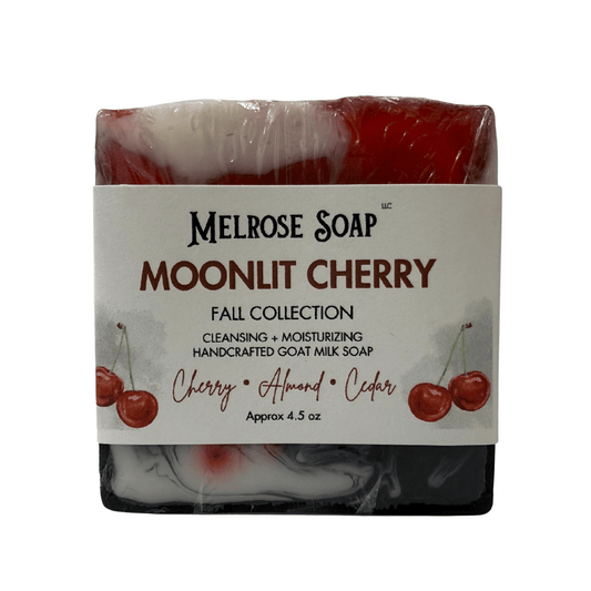 Moonlit Cherry handcrafted goat milk soap bar from Melrose Soap Fall Collection. Made with goat milk and activated charcol and scented with cherry, almond, and cedar, approx. 4.5 oz.